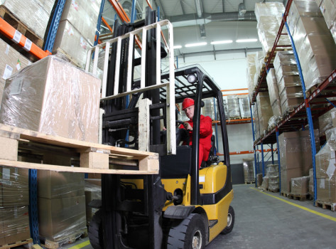 Forklift in warehouse.